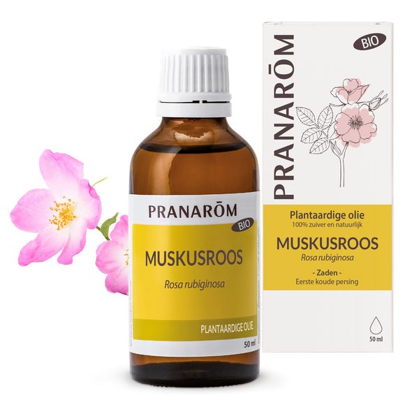 50ml bottle of Pranarôm organic rose hip plant oil, with a rose hip.